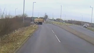 Dramatic dash cam footage shows moment car flips over roundabout [upl. by Namie]