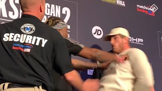 Logan Paul Gets PUSHED by KSI at Fighter Press Conference [upl. by Ylrebmyk]