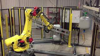 Automated Well Tank Handling System with FANUC R2000iC Robot  Motion Controls Robotics [upl. by Annaet]