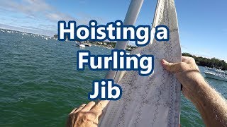 Hoisting a Furling Jib  Sail Fanatics [upl. by Ahsinuq]