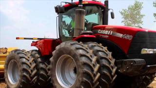 Case IH Steiger Tractors and Ashland PullType Scrapers [upl. by Ayerim735]