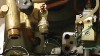 POTTERTON COMBI BOILER 28HE DIVERTER VALVE REPLACE [upl. by Ahserak]