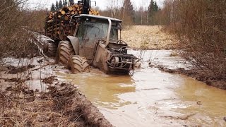 Valtra forestry tractor logging in wet conditions [upl. by Airbmat]