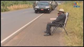 President Museveni answers a phone call by the roadside [upl. by Phaidra365]